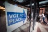 People enter a municipal election polling station in Vancouver, on Saturday, Oct. 20, 2018. THE CANADIAN PRESS/Darryl Dyck