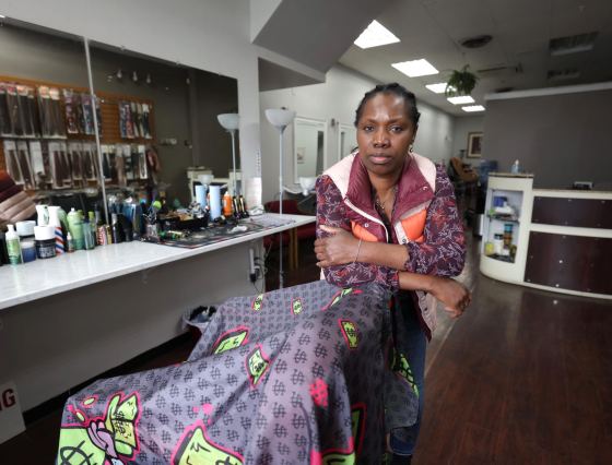 Elisabeth Mague, who owns Elisabeth Hair Salon on Portage Ave. near Sherbrook Street, says she's noticed police and outreach teams in the area. (Ruth Bonneville / Free Press)